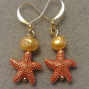Red starfish with pearl